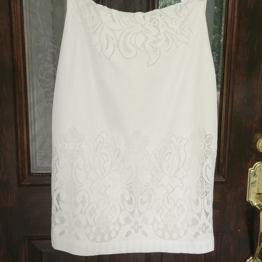 Eva Mendes white pencil skirt.